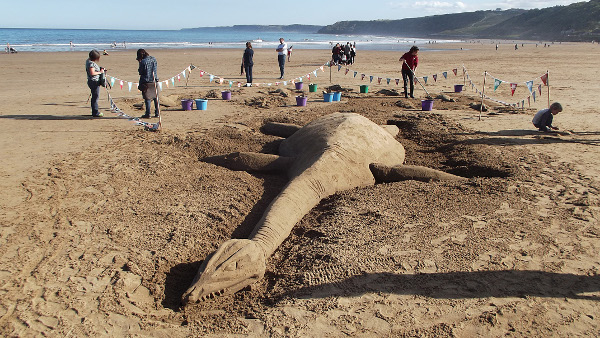 Newsletter Number 90 - A beached plesiosaur basking on the sand in sunny Scarborough Newsletter Number 90 - A beached plesiosaur basking on the sand in sunny Scarborough